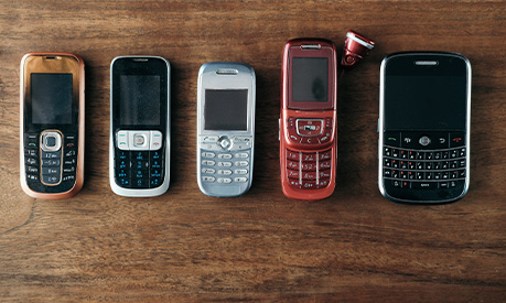 a collection of old mobile phones 