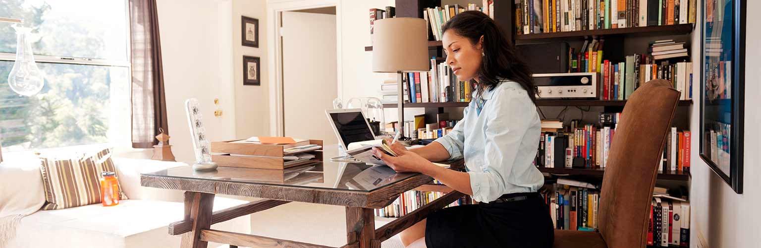 a businesswoman working from home office